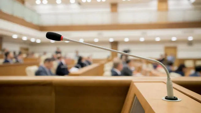 Microphone in a local government meeting Microphone in a local government meeting